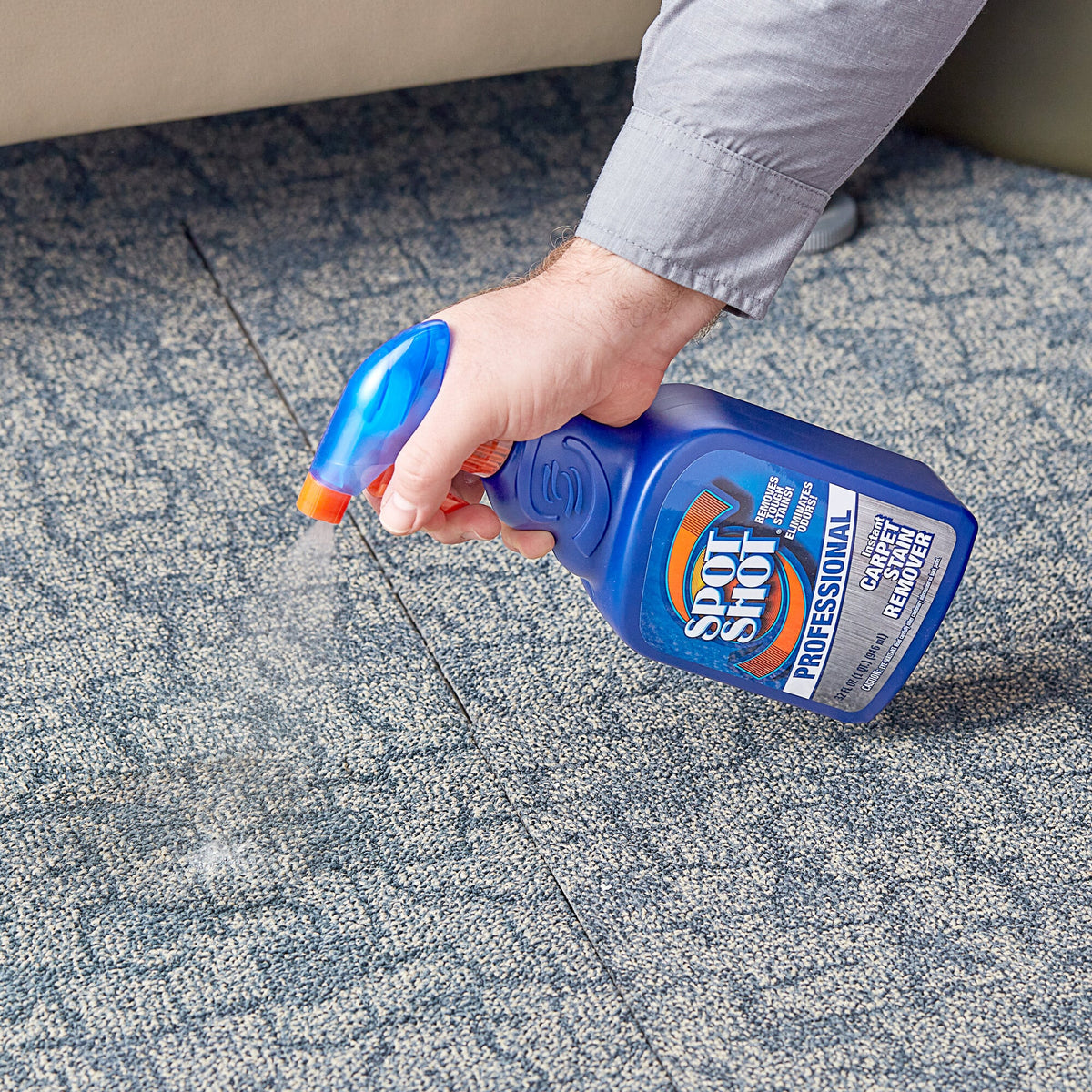 Spot Shot Professional 32 fl oz trigger bottle applied to carpet; one bottle shown, merchant bundle contains nine bottles